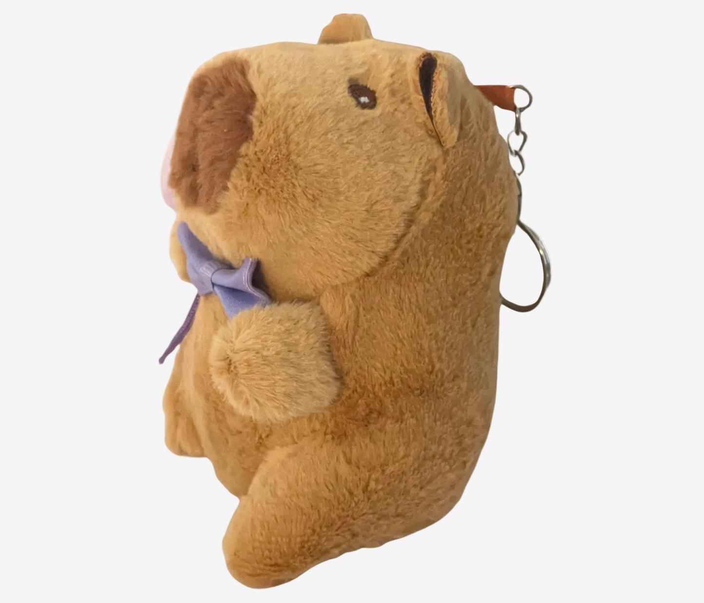 Plush bear keychain with a purple bow on a white background