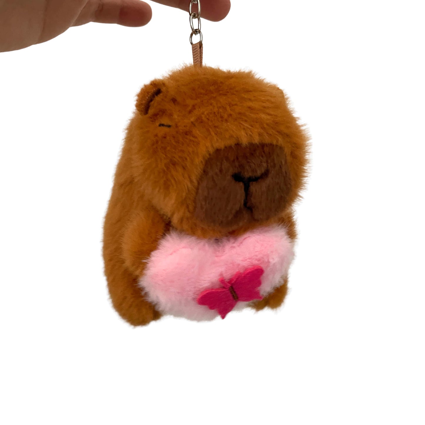 Blossom - Capybara plushie keychain hugging pink heart with butterfly decoration