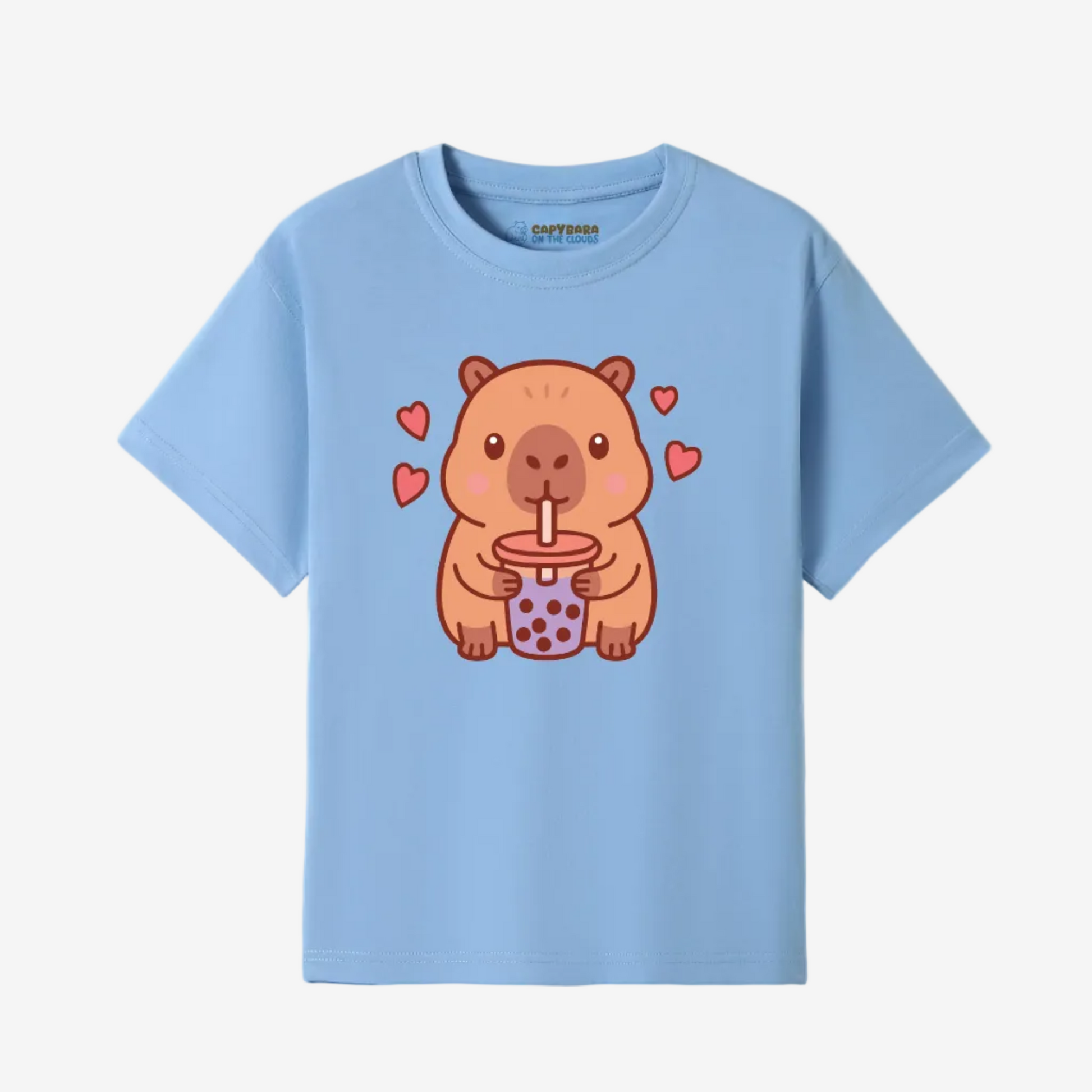 Light blue t-shirt with a cartoon capybara holding a drink and hearts on a white background