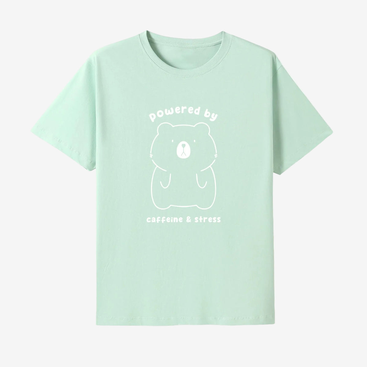 Mint green t-shirt with a bear graphic and text on a white background