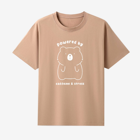 Beige t-shirt with a bear graphic and text on a white background