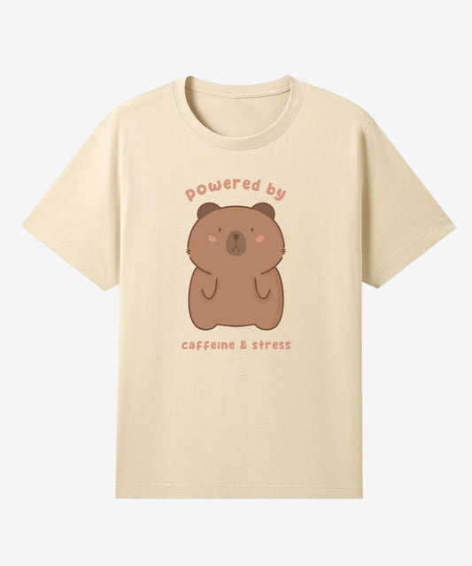Beige t-shirt with a bear graphic and text on a white background