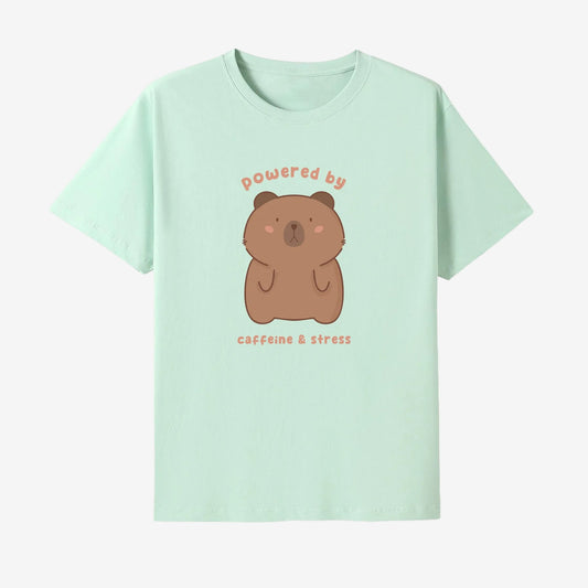 Light green t-shirt with a bear graphic and text on a white background