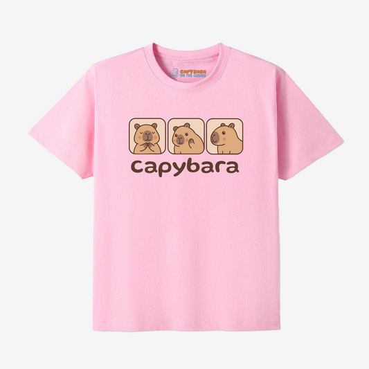 Pink t-shirt with capybara graphic and text on a white background