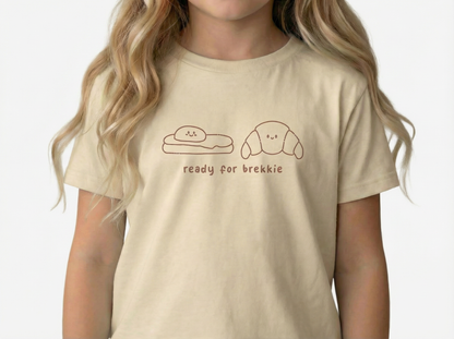 Girl wearing ready for breakkie tee