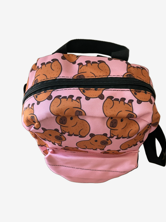 Pink bag with capybara pattern on a white background