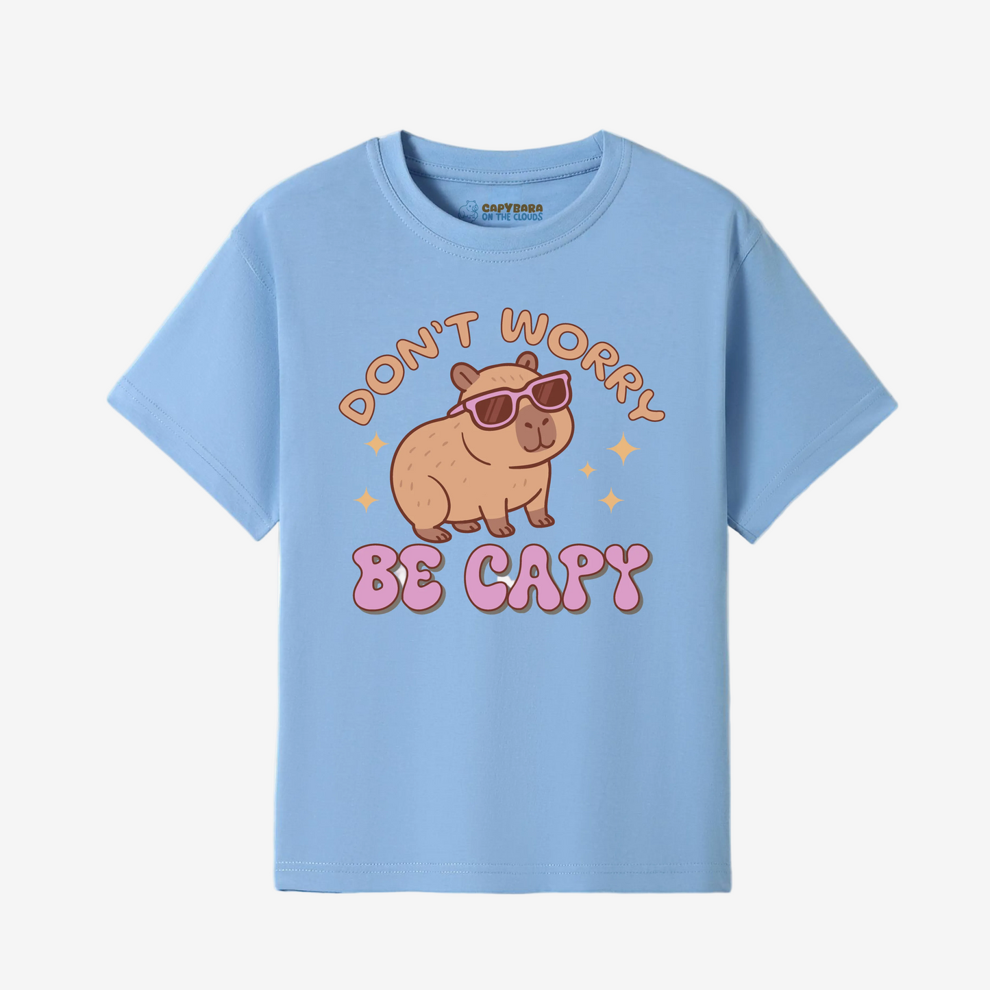 Light blue t-shirt with a cartoon capybara and text on a white background